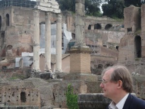 Examining a seagull on a pillar in the Roman Forum