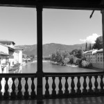 View from the Bridge of the trout filled river and Monte Grappa in the distance